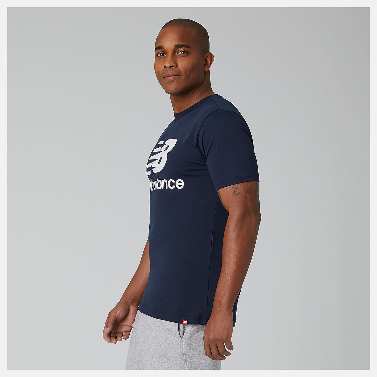 Essentials Stacked Logo Tee - New Balance Discount